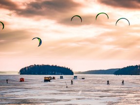 Snowkites and ice fishers dot Rice Lake at the Elmhirst Resort. (Photo by Justen Soule)