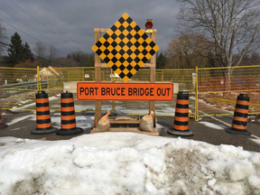 The sign says it all one year after a bridge over Catfish Creek in Port Bruce collapsed. Elgin County is seeking financial help from the provincial government to replace the collapsed bridge. (Derek Ruttan/The London Free Press)