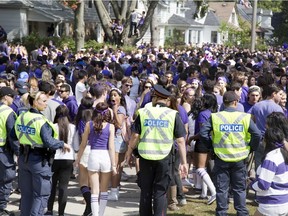 More than 5,000 Western University supporters  partied on Broughdale Avenue during Homecoming Weekend on Saturday, September 20, 2014. (DEREK RUTTAN/ The London Free Press)