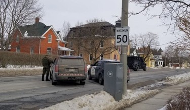 Perth County OPP officers have closed off a section of Main Street in Listowel. Police have surrounded a house on the street as part of an investigation. GALEN SIMMONS/THE BEACON HERALD