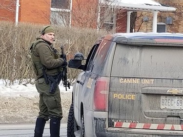 Armed tactical officers are at the scene of a potential standoff on Main Street in Listowel. GALEN SIMMONS/THE BEACON HERALD