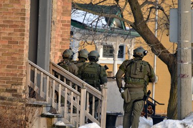 Armed tactical officers were at the scene of a  standoff on Main Street in Listowel for much of Friday afternoon. The incident ended peacefully with the arrest of suspect Nathan Chambers in the early evening. GALEN SIMMONS/THE BEACON HERALD