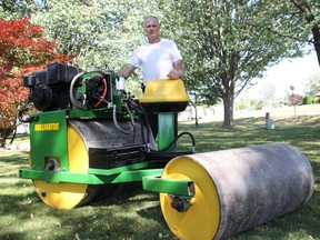 Jason Cates stands with his 'Rollinator' lawn roller in June, 2018 at his home in Wyoming. The Enbridge worker is one of three finalists in the Princess Auto Ultimate Figure-it-Outer contest.