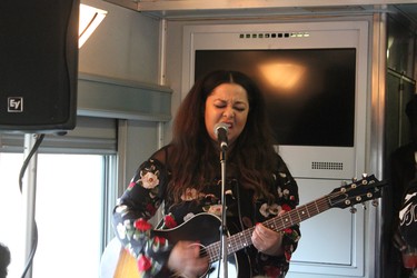 Juno nominee Nuela Charles rode into London Friday afternoon aboard a musician-packed passenger train dubbed the Juno Express. She performed a song while on board. (MEGAN STACEY, The London Free Press)