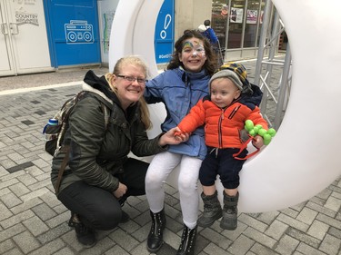 Ashley Moon, Faith and Robin enjoy the large swings installed by the city on Dundas Place as part of the flex streets official launch on Friday, one of several activities happening across the city leading up to the big Juno Awards ceremony on Sunday. JONTHAN JUHA/THE LONDON FREE PRESS