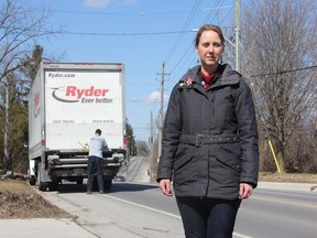 Coun. Elizabeth Peloza stands on Upper Queens Avenue just as a truck  blocks the street’s bike lane. Peloza is leading a push to ensure vehicles aren’t allowed to park in bike lanes along the city’s cycling network. JONATHAN JUHA/THE LONDON FREE PRESS