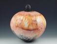 Saggar-Fired Lidded Vessel is by Judy Blake