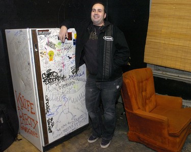 Tony Lima is shown in the upstairs room where bands wait before playing at the Call the Office.n/a