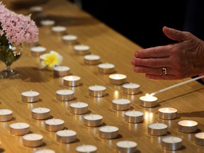 Local Grafton residents light candles during a prayer vigil conducted by Dean, Reverend Dr Gregory Jenks in solidarity with the families and victims of the Christchurch attacks, the vigil was held at the Christ Church Cathedral on March 18, 2019 in Grafton, Australia. Australian-born resident of Dunedin, Brenton Harris Tarrant grew up in the Australian town of Grafton where he reportedly attended Grafton High School and worked at a local Gym. He has been charged with murder following attacks on the Al Noor mosque and Linwood mosque in Christchurch on Friday, 15 March which took the lives of 50 people and many injured still remain in hospital. The attack is the worst mass shooting in New Zealand's history. (Photo by Lisa Maree Williams/Getty Images)