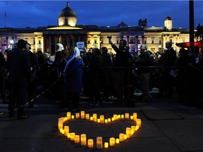 People attend a vigil in central London, England, in honour of the victims of the Christchurch mosque attacks in New Zealand. (Getty Images)