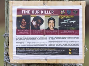 A sign is posted on a wooden pole asking for people to come forward with information after three Six Nations residents were found murdered Nov. 4, 2018 in Middlesex Centre, near the Oneida Nation of the Thames, near London. Ontario Provincial Police continued their investigation Sunday morning, with Fourth Line Road of the Six Nations of the Grand River Territory closed between Tuscarora and Onondaga Roads. A 36-year-old Six Nations woman was arrested at a residence in the area Friday night, and has been charged with three counts of accessory after the fact to murder.  Brian Thompson/Brantford Expositor/Postmedia Network ORG XMIT: POS1811251349086550