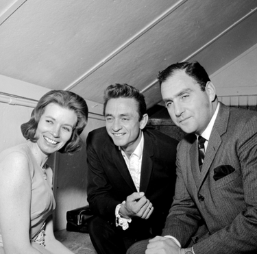 June Carter, left, Johnny Cash and Saul Holiff are seen in a Feb. 11, 1964 photograph. Carter was on the bill when Cash headlined at the old London Arena that night. Holiff, a Londoner, had been managing Cash for about four years at the time. (Courtesy of LFP Collection of Photographic Negatives/Western Archives)