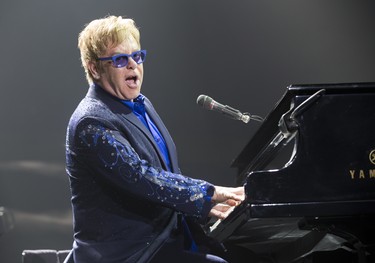 Elton John performs for a sold out crowd at Budweiser Gardens in London, Ont. on Monday February 3, 2014. DEREK RUTTAN/The London Free Press/QMI Agency