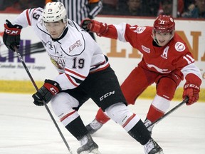 Soo Greyhounds Mac Hollowell pursues Owen Sound Attack Barret Kirwin at GFL Memorial Gardens in Sault Ste. Marie, Ont., on Friday, March 29, 2019. (BRIAN KELLY/THE SAULT STAR/POSTMEDIA NETWORK)