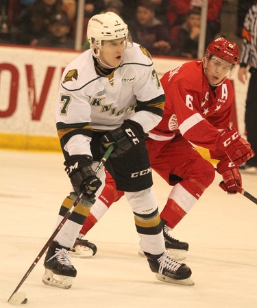 London Knights Joey Keane carries the puck withSoo Greyhouunds Jordan Sambrook nearby during first-period Ontario Hockey League action at GFL Memorial Gardens in Sault Ste. Marie, Ont., on Friday,March 15, 2019. (BRIAN KELLY/THE SAULT STAR/POSTMEDIA NETWORK)