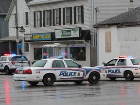 A woman was taken to hospital with unknown injuries after being struck by a vehicle at Wellington and Horton streets Wednesday morning. DALE CARRUTHERS / THE LONDON FREE PRESS