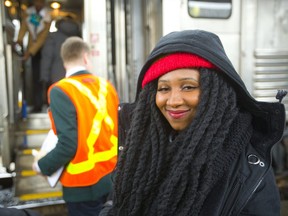 Chelsea Stewart, who is nominated for the Juno for reggae recording of the year, gets off the Juno Express at London's Via Rail station. (Mike Hensen/The London Free Press)