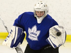 London Nationals netminder Zach Springer makes a glove save during practice at the  Wester Fair Sports Centre in London, Ont. on Thursday September 6, 2018. Derek Ruttan/The London Free Press/Postmedia Network ORG XMIT: POS1809061553468278