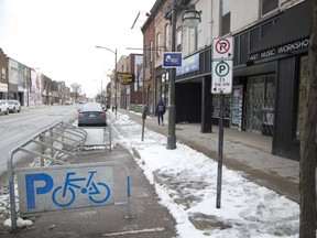 Parking spots the south side of Dundas Street east of Adelaide Street  may be replaced a bike lane in London. Derek Ruttan/The London Free Press