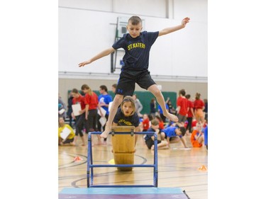 Alessandro DaCosta (8) (leaping) and Alexander Murataj (7) of St. Kateri Catholic School in London perform during the London District Catholic school board gymnastics meet at the Carling Heights Optimist Centre in London, Ont. on Tuesday March 5, 2019. The five-day meet wrapped up on Tuesday having seen more than 2,500 participants from 45 schools. Derek Ruttan/The London Free Press/Postmedia Network