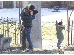 Dario Novoa-Sanchez, 8, leaps into the arms of his father Dario Novoa to the cheers of his twin brother, Carlos Novoa-Sanchez, as the three explore the Forks of the Thames. “It’s such a beautiful day to get out in nature and enjoy it,” said Novoa. (DEREK RUTTAN, The London Free Press)