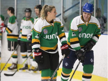 Canadian national women's hockey team member Natalie Spooner skates with former New York Islander Brad Dalgarno during a pre-scrimmage warm up in preparation for the Juno Cup on Thursday March 14, 2019 in London. The Juno Cup is an annual celebrity fundraising hockey game in support of MusiCounts, Canada's music education charity. The game, featuring musicians, former NHL players and members of the national women's hockey team, will take place Friday, March 15 at the Western Fair Sports Centre. (Derek Ruttan/The London Free Press)
