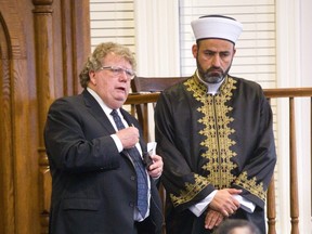 London mayor Ed Holder talks about the need for all people to be able to worship freely with Imam Amin Al-Ali at the London Mosque in the wake of the massacre in a Christchurch New Zealand mosque killed 49 people.  Mike Hensen/The London Free Press)