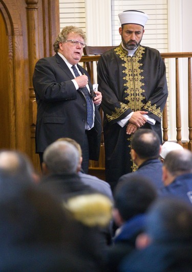 London mayor Ed Holder talks about the need for all people to be able to worship freely with Imam Amin Al-Ali at the London Mosque in the wake of the massacre in a Christchurch New Zealand mosque killed 49 people.  Mike Hensen/The London Free Press)