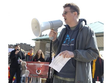 Graduate student David Blocker speaks to more than 100 people who participated in a protest at Western University in London on Wednesday against the Ontario government's changes to its student assistance plan, which will eliminate free tuition for the neediest families and also allow students to opt out of some compulsory fees for student services and club. (Derek Ruttan/The London Free Press)