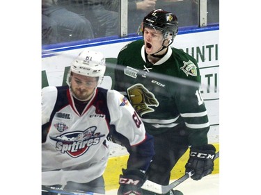 London Knight  Connor McMichael howls behind Windsor Spitfires captain Luke Boka after McMichael scored during the third period of Game 2 at Budweiser Gardens in London on Sunday. (Derek Ruttan/The London Free Press)