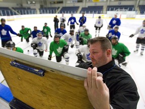 London Nationals assistant coach Randy Wilcox outlines some drills at their practice at the Western Fair Sports Centre in London, Ont.  (Mike Hensen/The London Free Press)