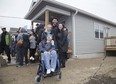 Two families, Brianne Hibma and her son Brayden Thompson (left) and Jodie Delaney and her son Adalton, were handed keys to their new Habitat For Humanity homes on Forbes Street in London, Ont. on Thursday March 28, 2019. Derek Ruttan/The London Free Press/Postmedia Network