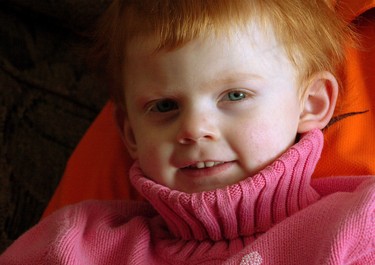 Reason to celebrate: Three-year-old Olivia Vander Schelde is decked out in pink during a visit to her home yesterday. (2007 File photo)