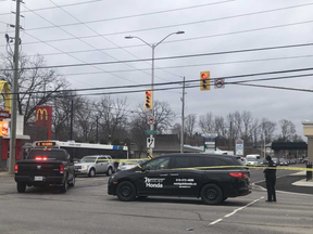 London police are seen at Oxford Street and Wharncliffe Road following a collision involving a pedestrian Friday morning. JONATHAN JUHA/THE LONDON FREE PRESS