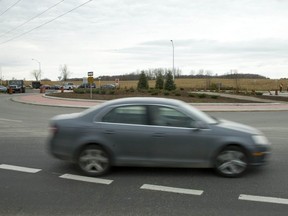 A driver navigates their way around roundabout, a two lane traffic control system at the intersection of Wonderland Road North and Sunningdale Road. (File photo)