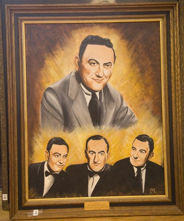 A painting of the Lombardo brothers is one of the many items from the Guy Lombardo Museum being auction by Gardner Galleries. Photo shot in London, Ontario on Wednesday, January 14, 2015. Museum.DEREK RUTTAN/ The London Free Press /QMI AGENCY