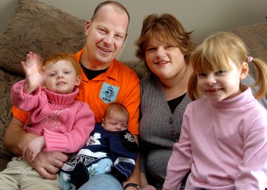 Growing family: The Vander Schelde family has a new addition this Christmas. Shown with parents Sam and Kimberley are, from left, Olivia 3, Sam, born Nov. 30, and Holland, 5. (2007 File photo)