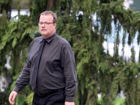 John Paul Stone approaches the Perth County Courthouse in Stratford, Ont. in this Beacon Herald file photo. Terry Bridge/Stratford Beacon Herald/Postmedia Network