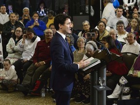 Prime Minister Justin Trudeau delivers an official apology to Inuit for the federal government's management of tuberculosis in the Arctic from the 1940s to the 1960s during an event in Iqaluit, Nunavut. THE CANADIAN PRESS/Sean Kilpatrick