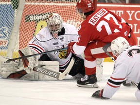 Owen Sound Attack goaltender Mack Guzda and teammate Sergey Popov defend against Soo Greyhounds forward Barrett Hayton during the first period of Game 2 in the Ontario Hockey League playoff series between the Attack and Greyhounds at GFL Memorial Gardens in Sault Ste. Marie, Ont., on Saturday, March 23, 2019. (BRIAN KELLY/THE SAULT STAR/POSTMEDIA NETWORK)