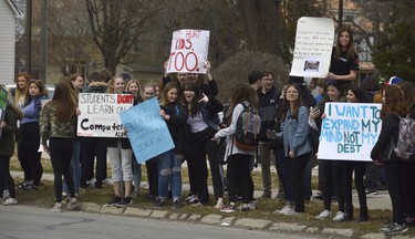 Students protest cuts to Ontario's public school system outside the Lambton-Kent District School Board headquarters in Sarnia Thursday afternoon. (Louis Pin/The Observer)