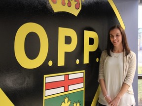 Melissa Jorgensen is one of about 140 communications operators at the OPP communications centre in London, which handles emergency calls for much of Southwestern Ontario. (JONATHAN JUHA, The London Free Press)