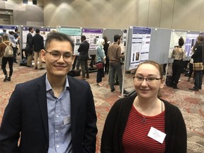 TianDuo Wang, a PhD student in medical biophysics at Western University, and Lauren Solomon, a post-doctoral associate in pathology and laboratory medicine at Western, were among the presenters at the London Health Research Day at the London Convention Centre Tuesday. More than 400 medical students, graduate students and postdoctoral researchers shared their latest studies at the eighth annual event. (Jennifer Bieman/The London Free Press)