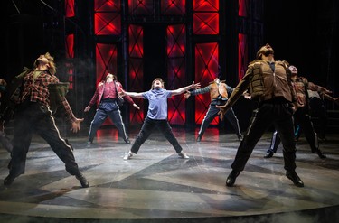 Nolen Dubuc (centre) as Billy Elliot and and members of the company perform Angry Dance.