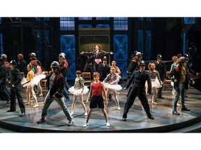 Nolen Dubuc (centre) as Billy Elliot is shown with members of the company in Billy Elliot the Musical performing Solidarity.