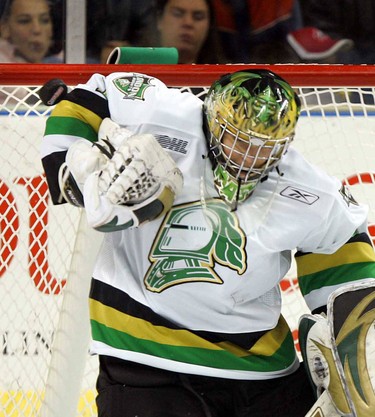 London Knight goalie Steve Mason makes a save during second period of their game vs the Guelph Storm at the JLC.n/a