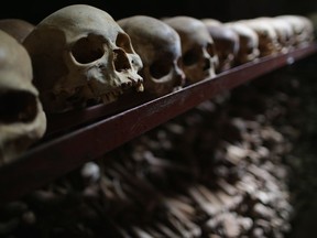 Metal racks hold the bones of thousands of genocide victims inside one of the crypts at the Nyamata Catholic Church memorial ahead of the 20th anniversary of the country's genocide April 4, 2014 in Nyamata, Rwanda. Attackers used guns and grenades to blast their way inside the church on April 13, 1994 where thousands of people had taken refuge, killing men women and children. The memorial's crypts contain the remains of over 45,000 genocide victims, the majority of them Tutsi, including those who were massacred inside the church itself.