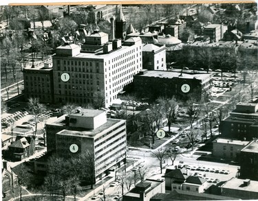 Aerial view of part of London's core area shows the Masonic Temple (2), the 50-year-old landmark at 250 Queen's Ave., which has been sold to the London Life iNsurance Co., other buildings numbered are (1) London Life, (3) Stollery Smallman Ltd. at 228 Queen's Ave and Dr. Charles A. Thompson's, 232 Queens Ave., the only two properties in the block now owned by London Life; (4) the nearby Two Hundred Queens Avenue building, 1962. (London Free Press files)