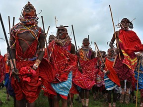 Kenyan Maasai Morans attend on December 15, 2018 a sporting event dubbed the Maasai Olympics at Kimana, near Kenya's bordertown with Tanzania. The olympics are an initiative of international conservation groups led by Born Free, which have been held every two years since 2012 to offer Maasai warriors an alternative to killing lions as part of their traditional rite of passage. It was the brainchild of the wildlife charity Big Life Foundation and eight Maasai elders who wanted to stop lion hunting by our warriors once and for all.