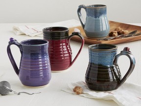 These clay mugs were designed by artisan Donna Rollins, who infuses her ceramic clay with minerals, then finishes each mug with the placement of a crystal on the handle. (uncommongoods.com)